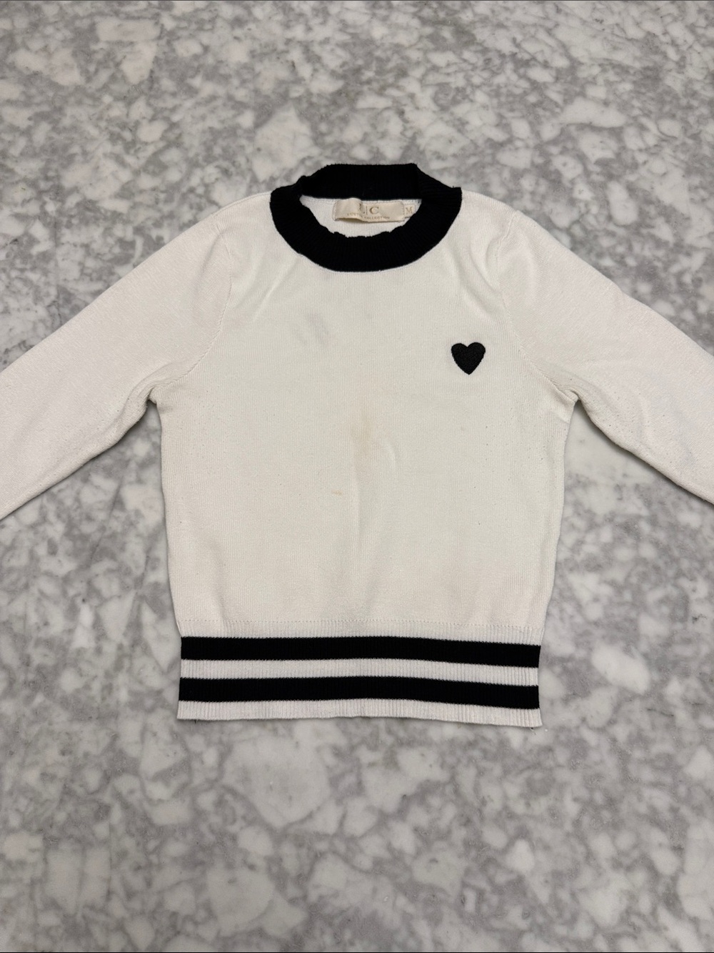 Women's White Knit Pullover with Black Trim and Heart Accent